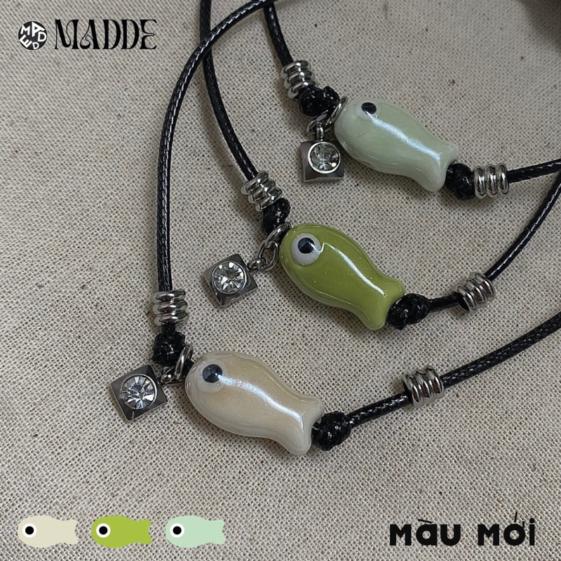Vòng tay con cá mắt quỷ sứ may mắn với charm thép không teng gỉ Madde
