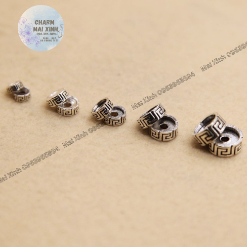 Charm chặn bạc - Hoạ tiết hoa văn