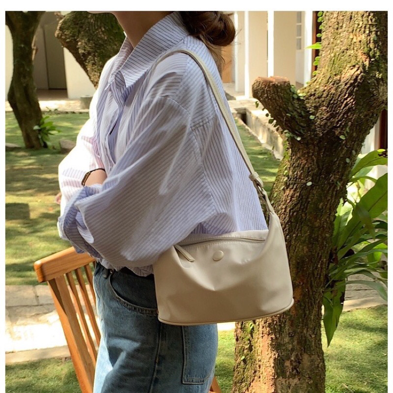 Túi đeo vai màu trắng sữa vải dù chống thấm nước