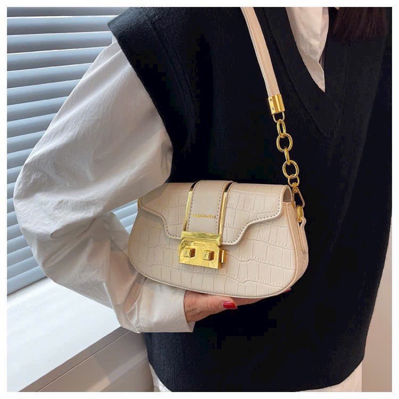 Túi kẹp nách nữ da vân khoá miu MP 84