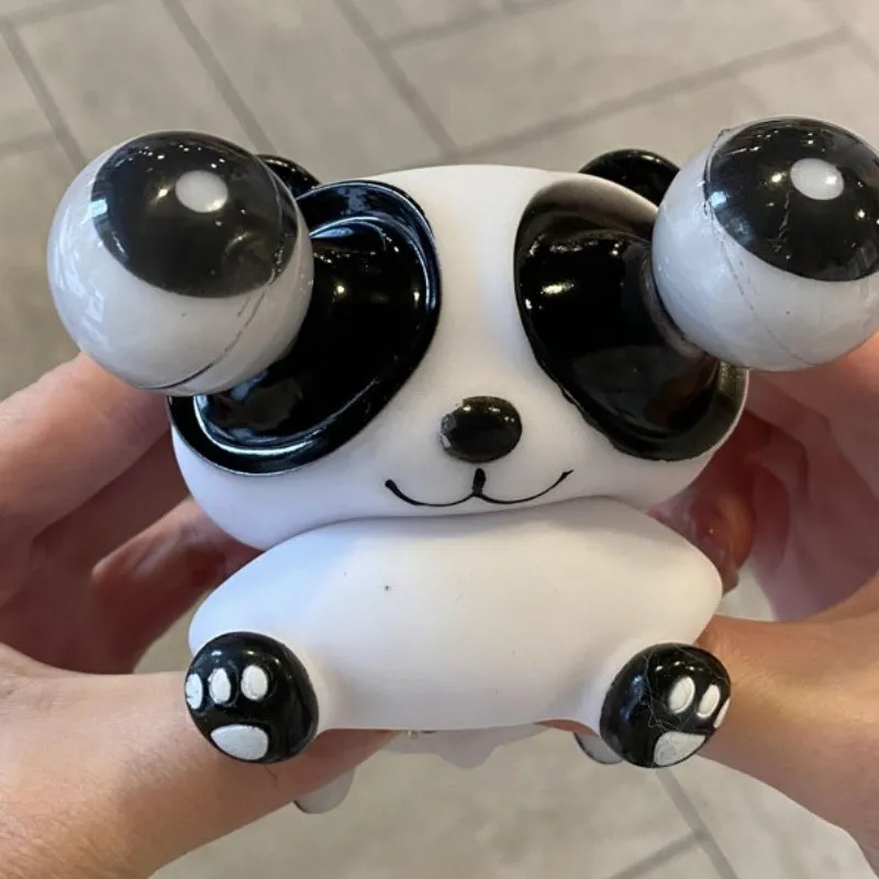 Giải nén mèo con ma thuật bóp gấu trúc mắt lồi thiết kế ngộ nghĩnh