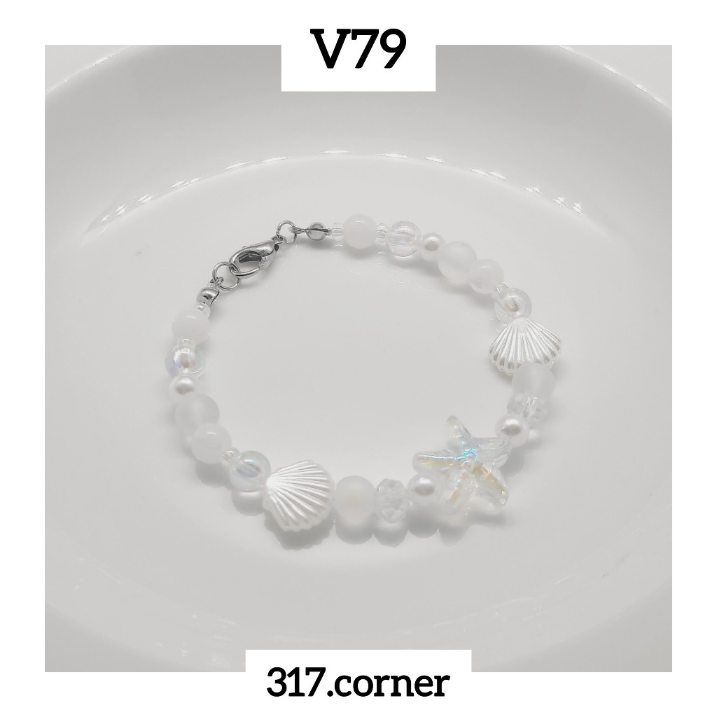 Vòng tay sao biển hạt cườm phối charm vỏ sò - V79 - 317.corner