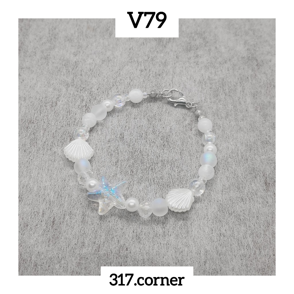 Vòng tay sao biển hạt cườm phối charm vỏ sò - V79 - 317.corner