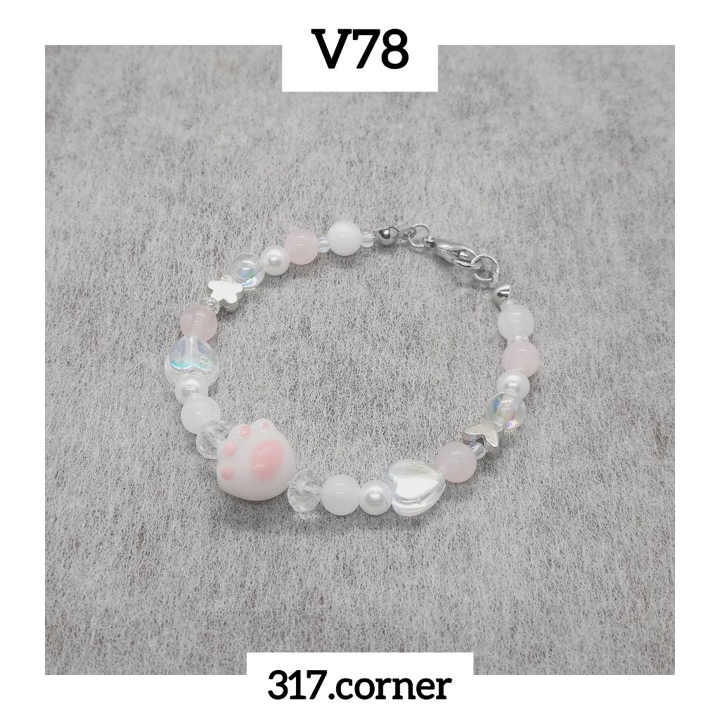 Vòng tay chân mèo hạt cườm phối charm - V78 - 317.corner
