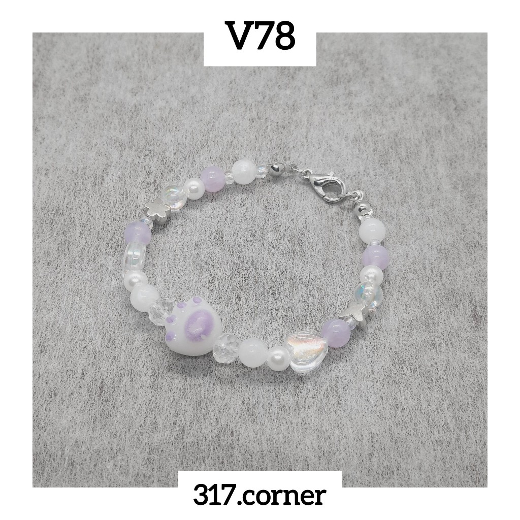 Vòng tay chân mèo hạt cườm phối charm - V78 - 317.corner