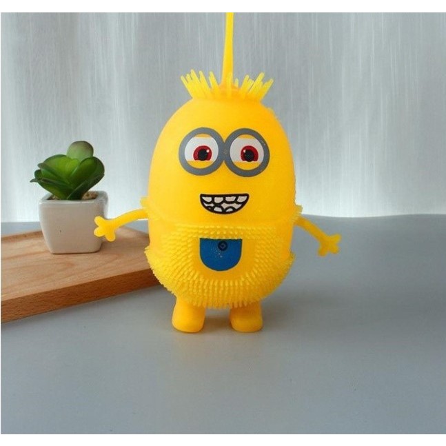 Đồ Chơi Minion Cao Su Cầm Tay Phát Sáng Cho Bé