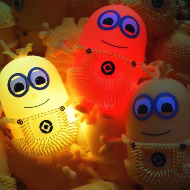 Đồ Chơi Minion Cao Su Cầm Tay Phát Sáng Cho Bé