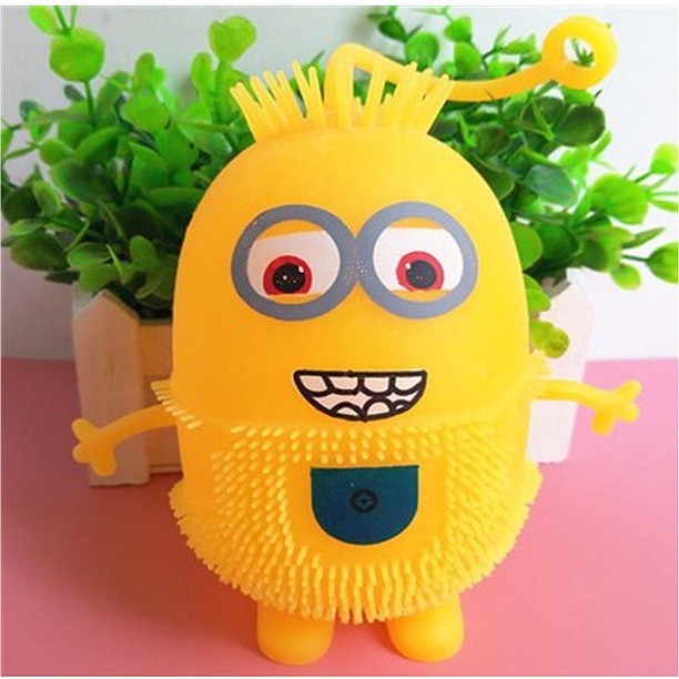 Đồ Chơi Minion Cao Su Cầm Tay Phát Sáng Cho Bé