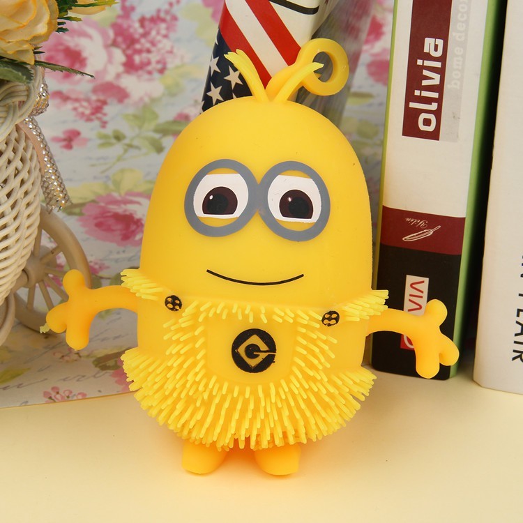 Đồ Chơi Minion Cao Su Cầm Tay Phát Sáng Cho Bé