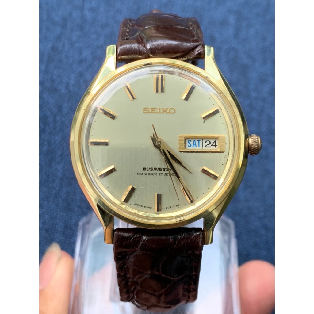 Đồng hồ nam Seiko Business-A automatic 27jewels, lịch thứ ngày, mặt màu vàng, niềng mạ vàng dây da của Nhật