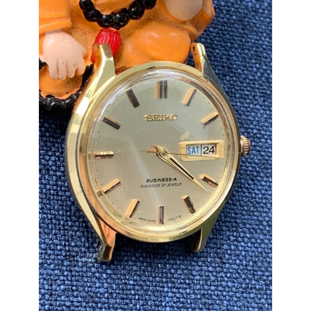 Đồng hồ nam Seiko Business-A automatic 27jewels, lịch thứ ngày, mặt màu vàng, niềng mạ vàng dây da của Nhật