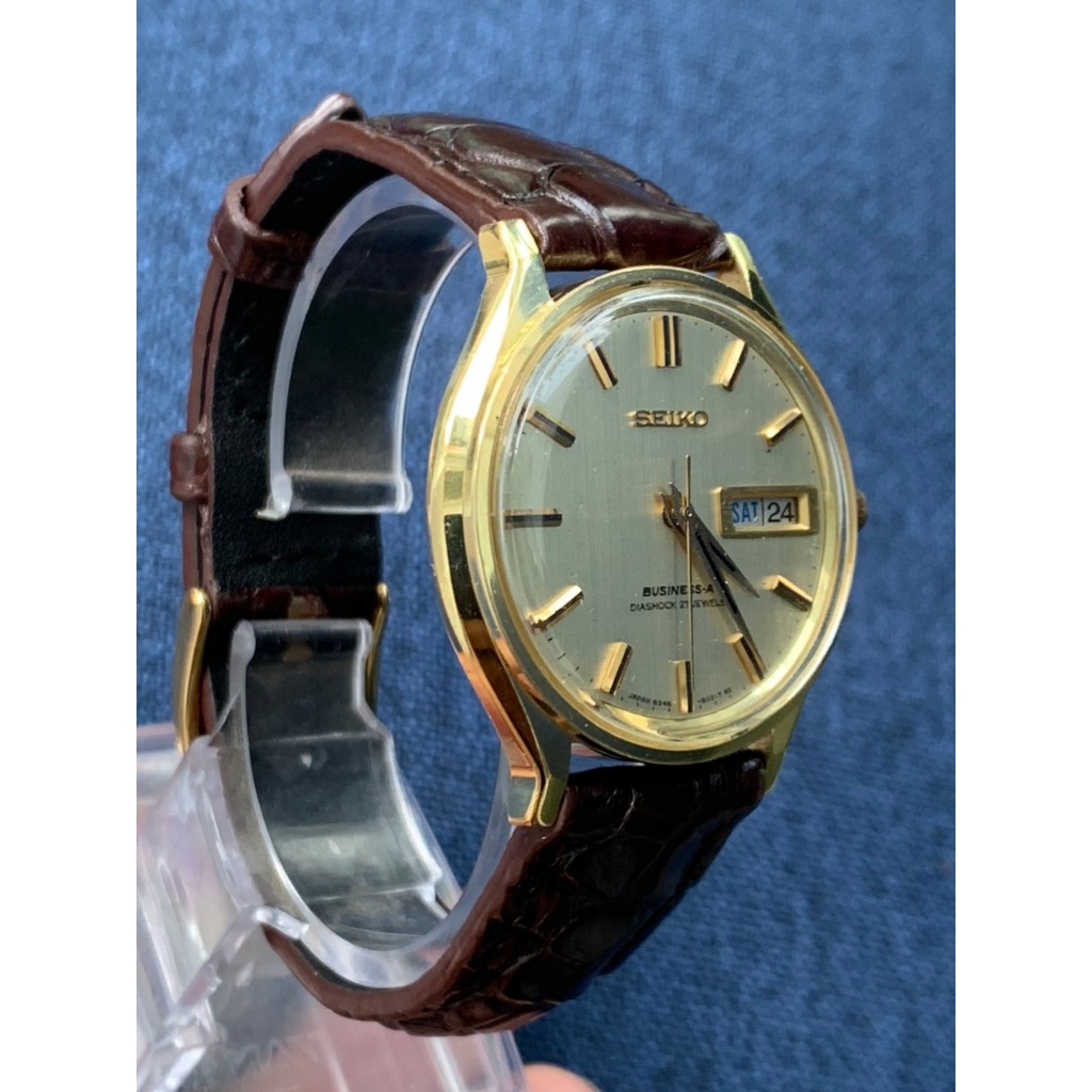 Đồng hồ nam Seiko Business-A automatic 27jewels, lịch thứ ngày, mặt màu vàng, niềng mạ vàng dây da của Nhật