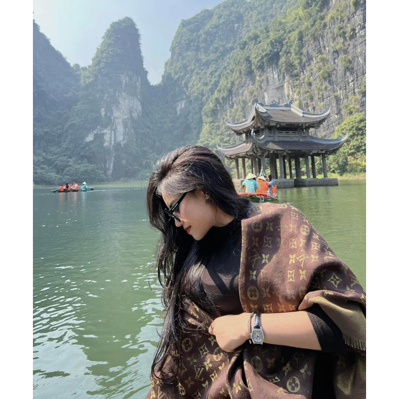 Đồng hồ Duolz mặt oval vuông quai da