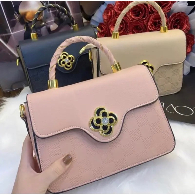 Túi đeo vai đeo chéo khoá hoa xoay công sở