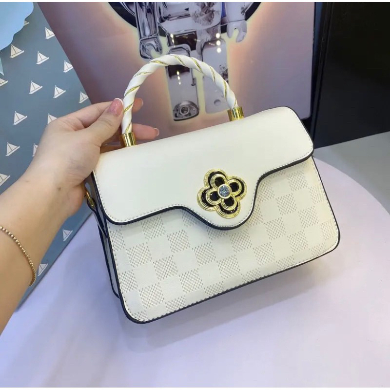 Túi đeo vai đeo chéo khoá hoa xoay công sở