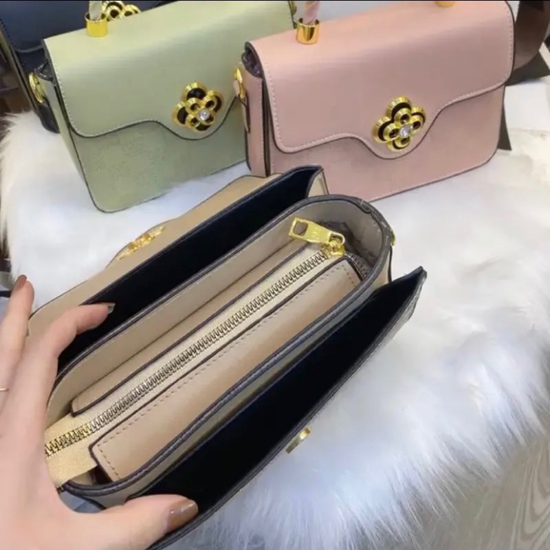 Túi đeo vai đeo chéo khoá hoa xoay công sở