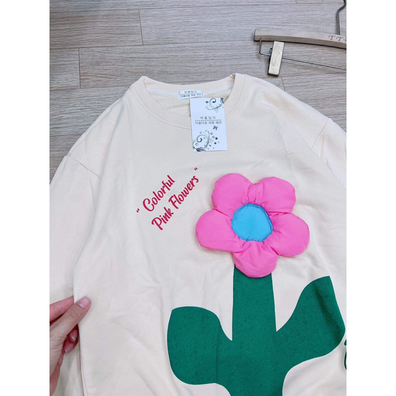 ÁO NỈ DA CÁ  BE  HOA NỔI DÁNG XUÔNG