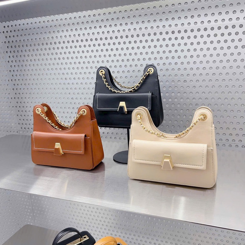 Túi đeo chéo Pê do miệng cong