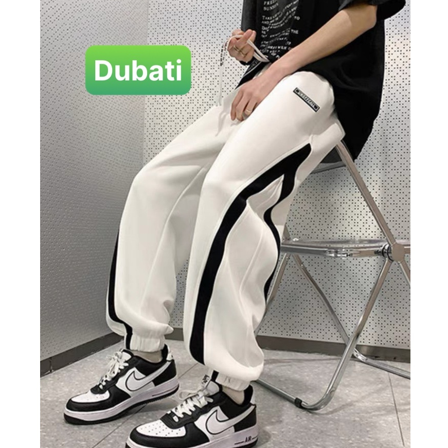 QUẦN JOGGER TRẮNG ĐEN SỌC CHÉO CHẤT NỈ DA CÁ NAM NỮ CÓ BO HOT TREND PHONG CÁCH CAO CẤP MỚI -DUBATI FASHION