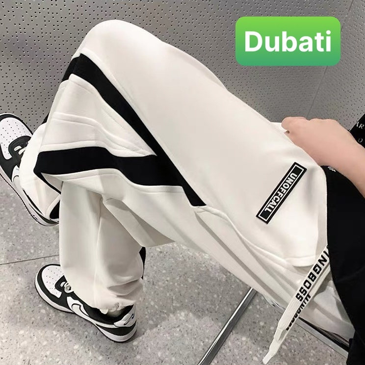QUẦN JOGGER TRẮNG ĐEN SỌC CHÉO CHẤT NỈ DA CÁ NAM NỮ CÓ BO HOT TREND PHONG CÁCH CAO CẤP MỚI -DUBATI FASHION