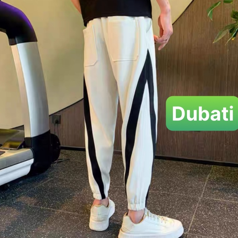 QUẦN JOGGER TRẮNG ĐEN SỌC CHÉO CHẤT NỈ DA CÁ NAM NỮ CÓ BO HOT TREND PHONG CÁCH CAO CẤP MỚI -DUBATI FASHION
