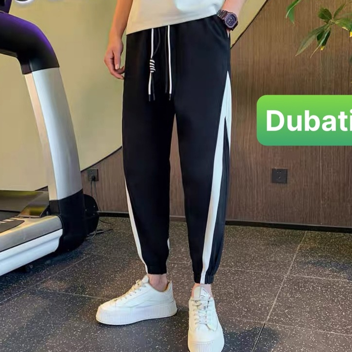 QUẦN JOGGER TRẮNG ĐEN SỌC CHÉO CHẤT NỈ DA CÁ NAM NỮ CÓ BO HOT TREND PHONG CÁCH CAO CẤP MỚI -DUBATI FASHION