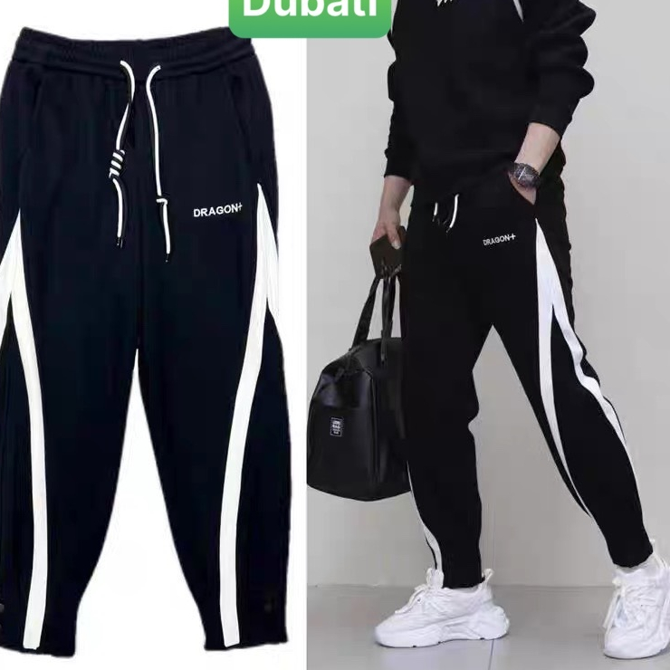 QUẦN JOGGER TRẮNG ĐEN SỌC CHÉO CHẤT NỈ DA CÁ NAM NỮ CÓ BO HOT TREND PHONG CÁCH CAO CẤP MỚI -DUBATI FASHION