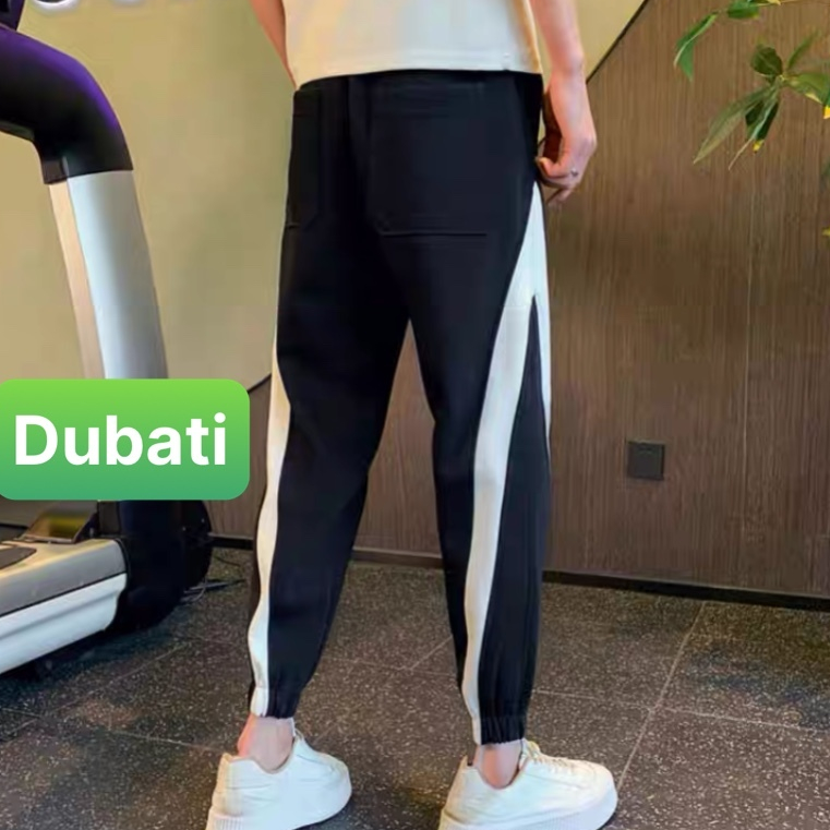 QUẦN JOGGER TRẮNG ĐEN SỌC CHÉO CHẤT NỈ DA CÁ NAM NỮ CÓ BO HOT TREND PHONG CÁCH CAO CẤP MỚI -DUBATI FASHION