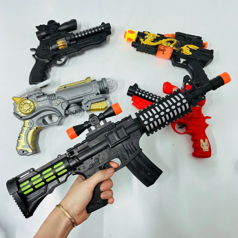Đồ chơi súng chạy pin, súng đồ chơi trẻ em có đèn và nhạc an toàn cho bé