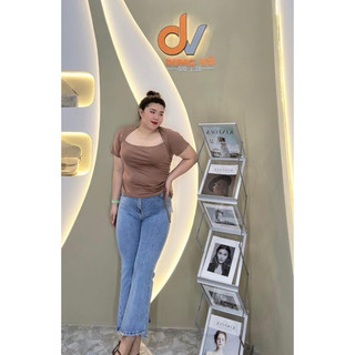 Quần jeans loe xẻ lai