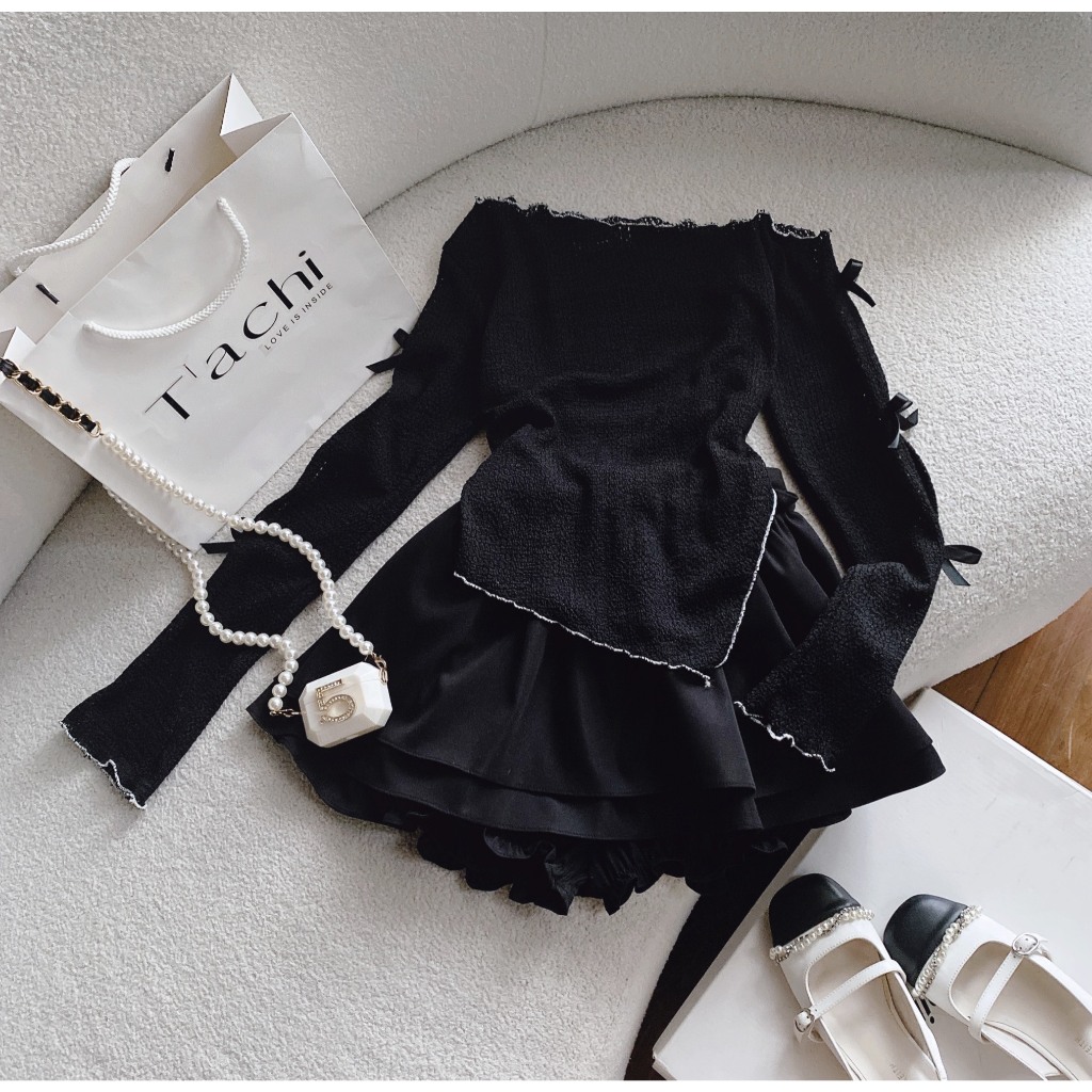 SET ÁO ĐEN LỆCH VAI KHOÉT LỔ ĐÍNH NƠ TAY DÀI + CHÂN VÁY REN XÒE PHỒNG LƯNG THUN  SHEEP