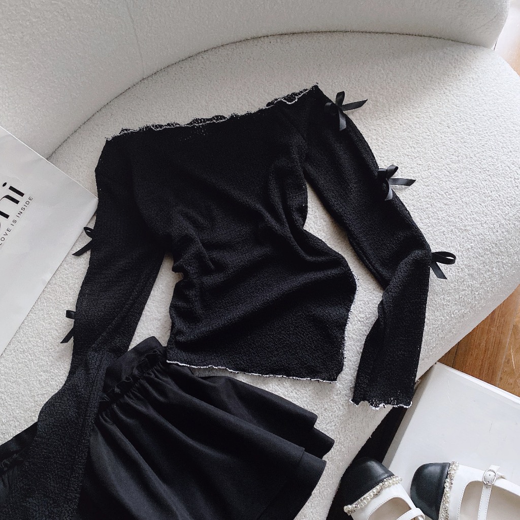 SET ÁO ĐEN LỆCH VAI KHOÉT LỔ ĐÍNH NƠ TAY DÀI + CHÂN VÁY REN XÒE PHỒNG LƯNG THUN  SHEEP