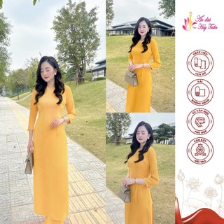 Áo dài truyền thống lụa Mỹ cổ tròn màu vàng nghệ,trơn