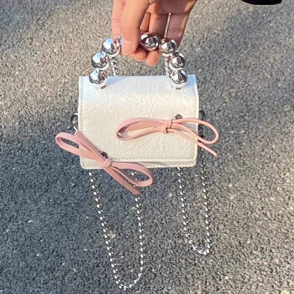 Túi xách nữ, túi đeo chéo thời trang công sở Hàn Quốc đeo chéo hot trend 2023 _ TÚI MINI ĐEO CHÉO ĐÍNH NƠ QUAI NGỌC