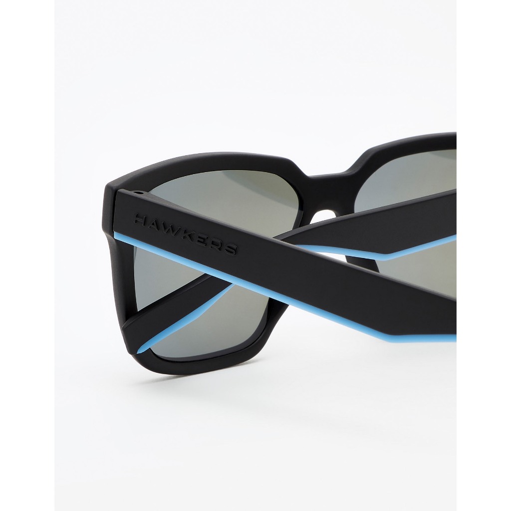 HAWKERS Motion Sunglasses For Men And Women, Unisex. Official Product Designed In Spain