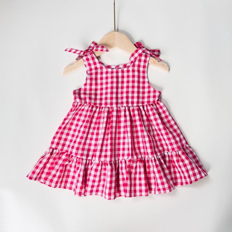 Váy bé gái sọc caro thắt nơ trên vai dáng xoè 8-15kg PUMPKINSHOP CS002