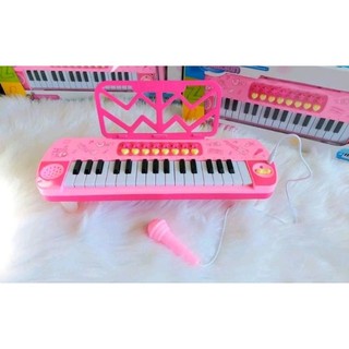 Đàn organ điện tử có loa và mic hát
