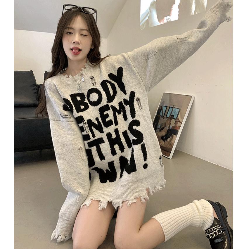 Áo len nữ Montoghi dệt kim DÁNG DÀI IN CHỮ phối RÁCH LAI TUA phom rộng siêu hot