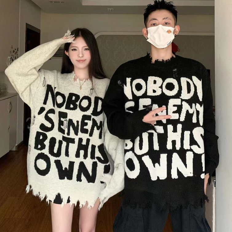 Áo len nữ Montoghi dệt kim DÁNG DÀI IN CHỮ phối RÁCH LAI TUA phom rộng siêu hot