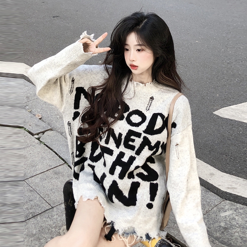 Áo len nữ Montoghi dệt kim DÁNG DÀI IN CHỮ phối RÁCH LAI TUA phom rộng siêu hot