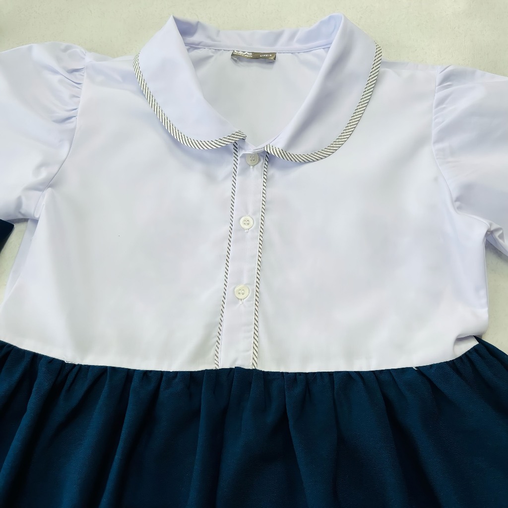 Váy bé gái váy đồng phục học sinh tiểu học từ 18-48kg.