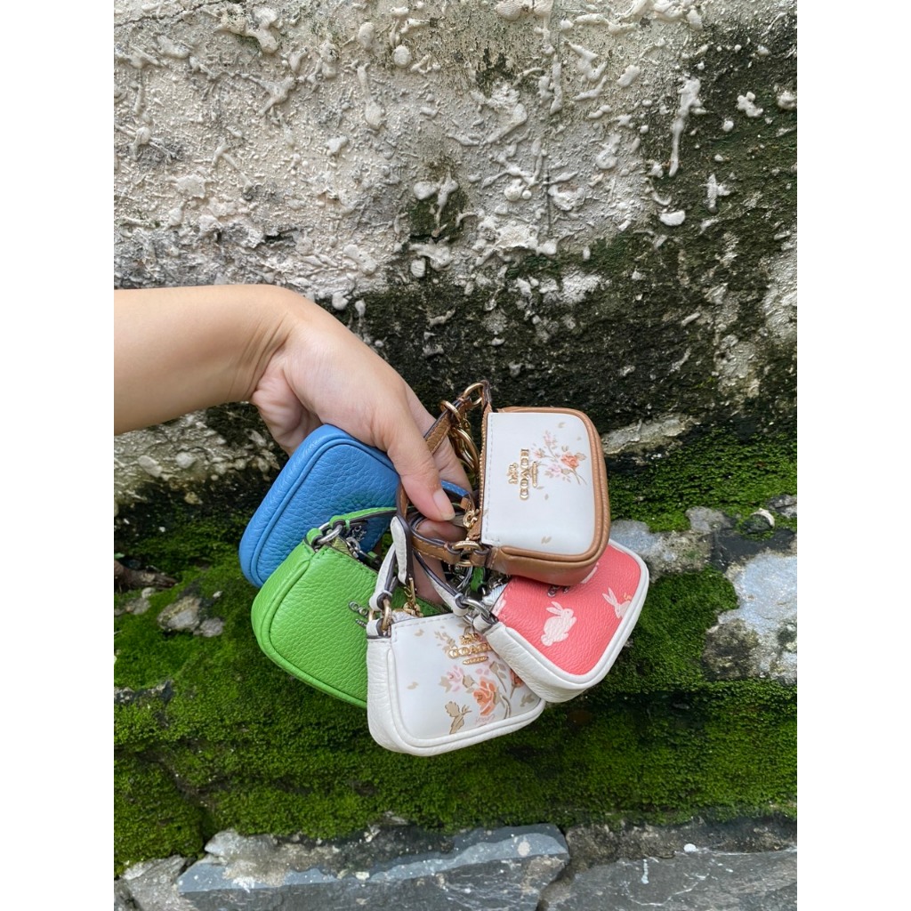 Coach Outlet Mini Nolita Bag Charm Màu Trắng Hoa Nâu Fullbox