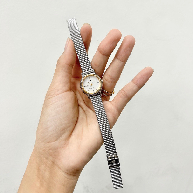 Đồng hồ si nữ máy nhật hiệu Noevip, mặt tròn dây kim loại trắng