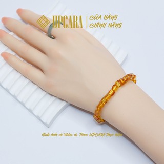 Vòng tay hổ phách hoa thiê nhiên giác vuông UPCARA