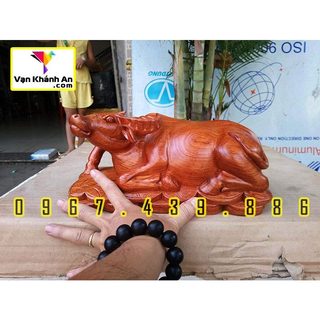 Tượng trâu tài lộc gỗ hương