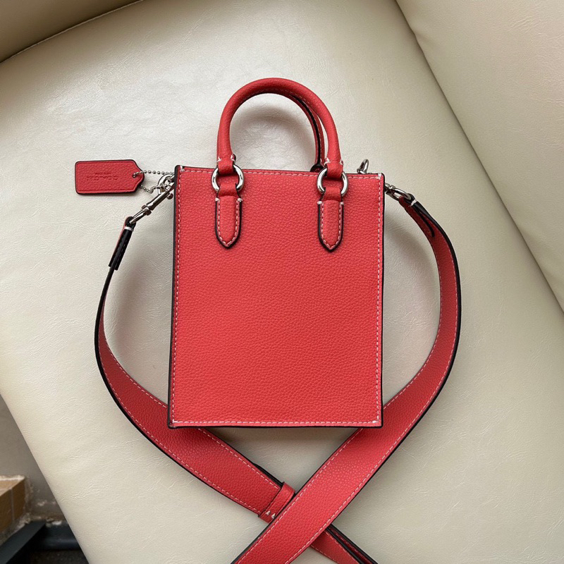 Túi coach north south mini