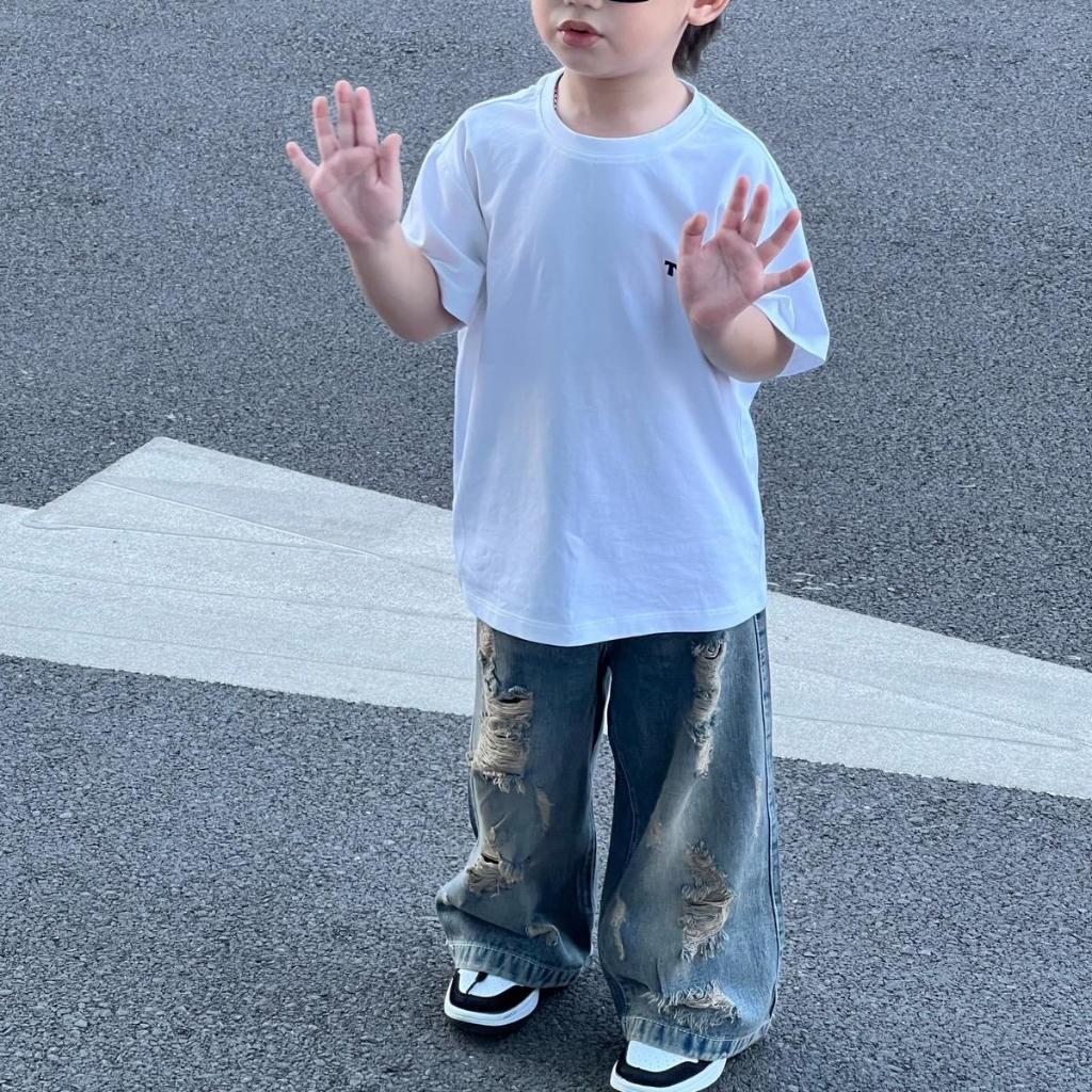 Quần Jeans rách cá tính cho bé