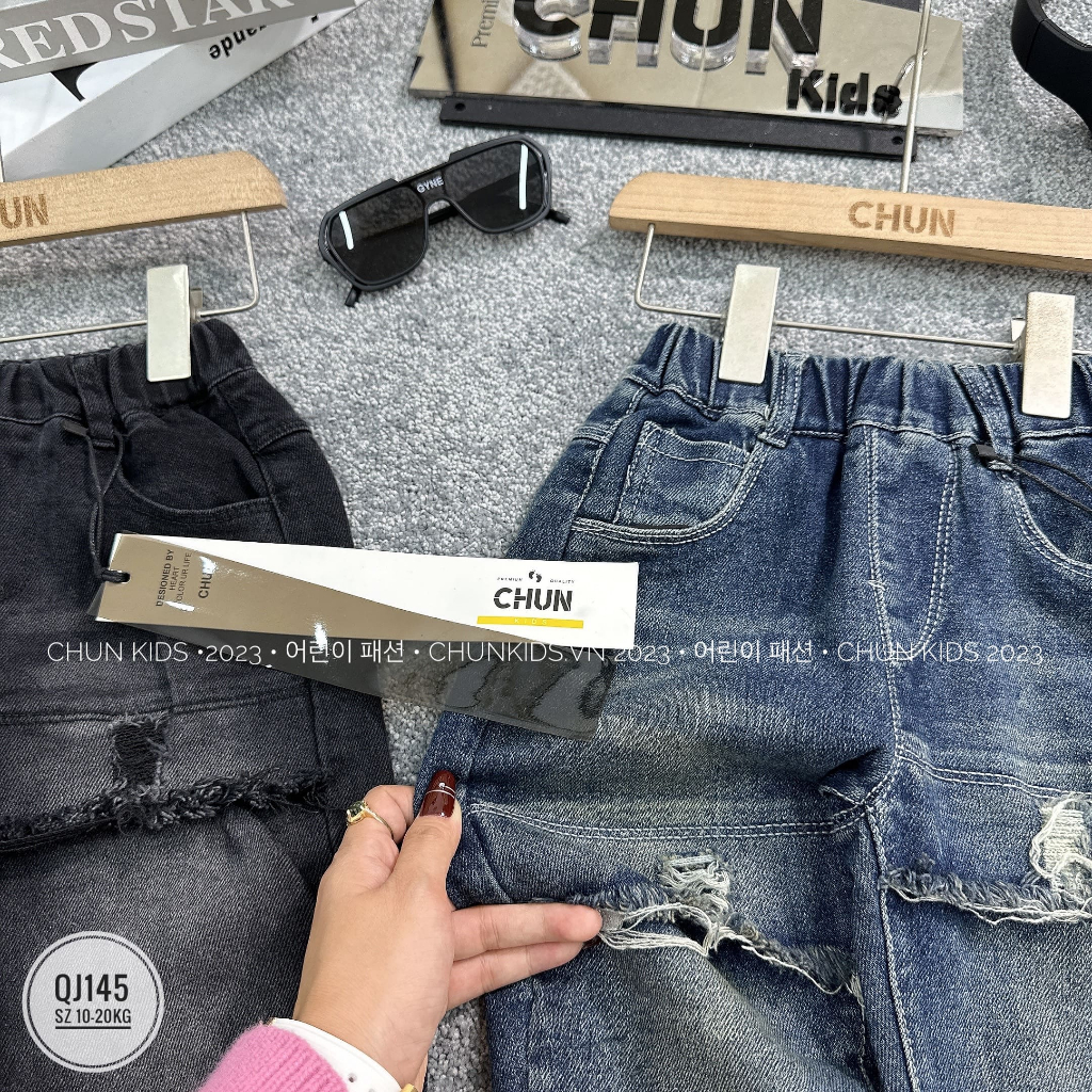QJ145 - QUẦN jean nhí CHUN đáp vạt bên cao bên thấp - 8802 cho Bé