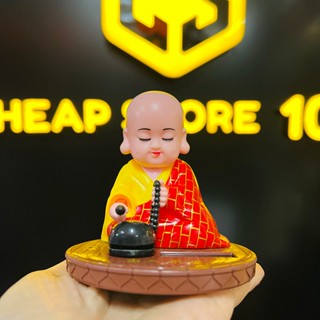 Tượng chú tiểu gõ mõ gật đầu bằng năng lượng ánh sáng