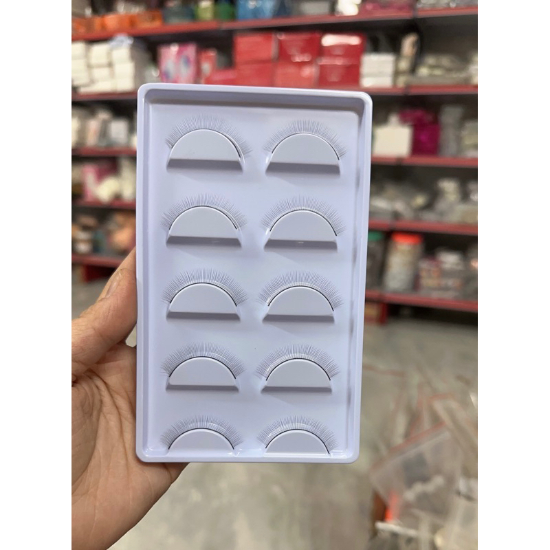Mi giả tập nối mi.